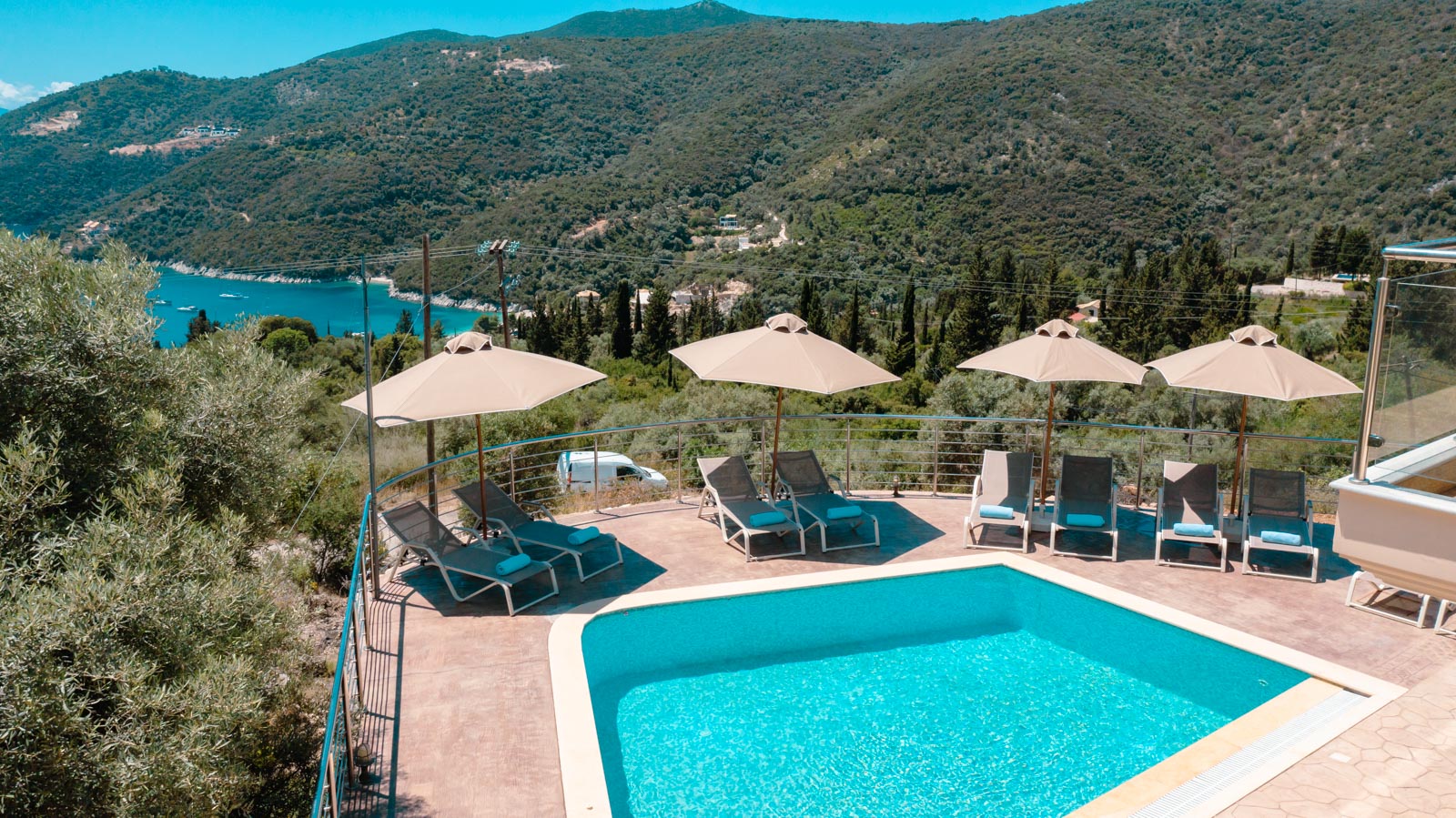 Pool Deck with Loungers and Bay View