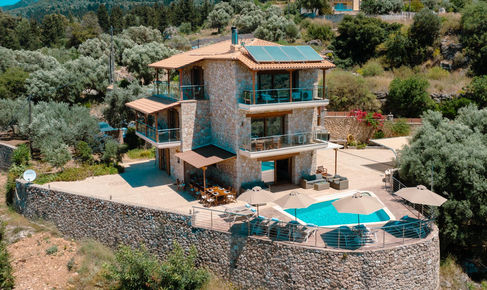 Aerial View of Stone Villa and Pool