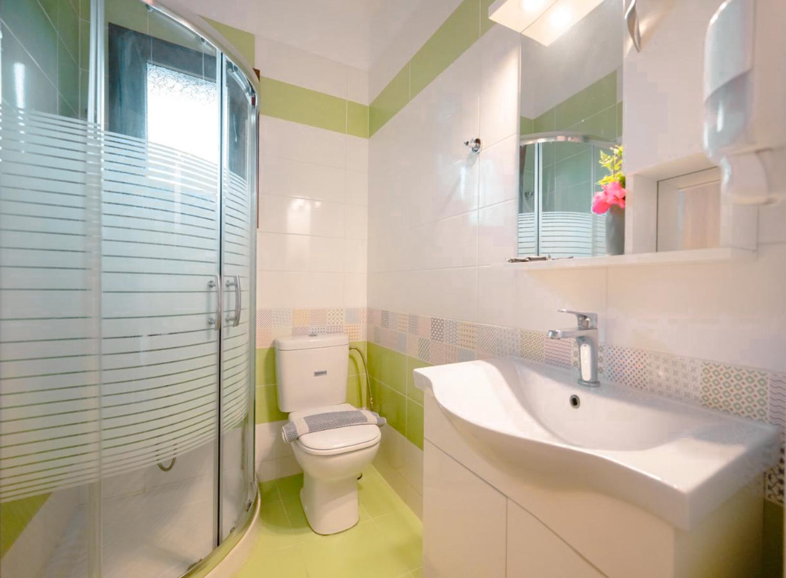 Bathroom with Green Accents