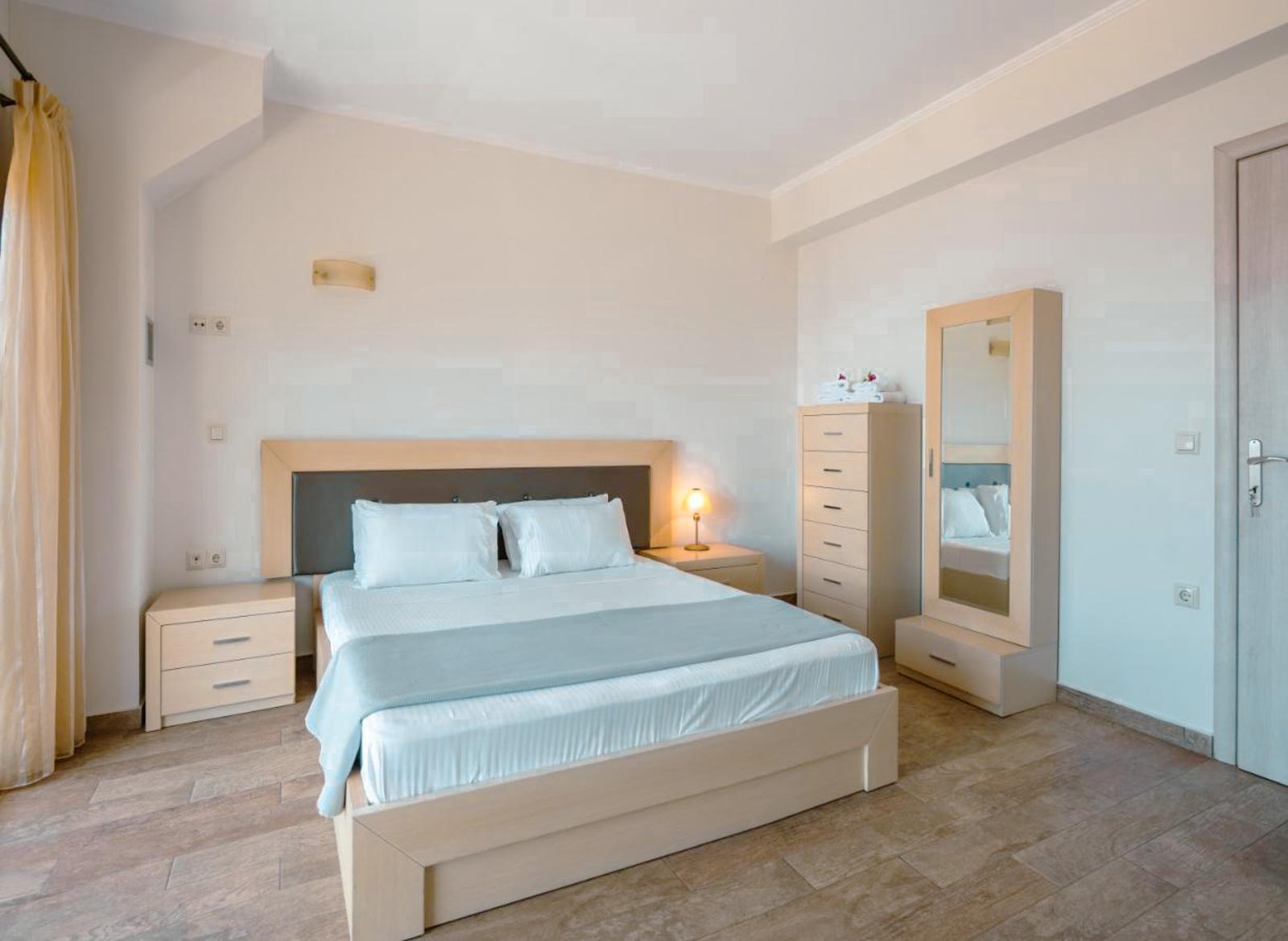 Bedroom with Light Wood Furniture